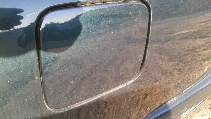 TAPA EXTERIOR COMBUSTIBLE