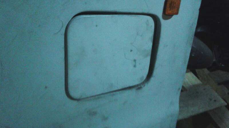 TAPA EXTERIOR COMBUSTIBLE