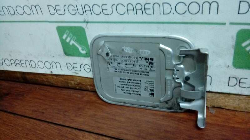 TAPA EXTERIOR COMBUSTIBLE