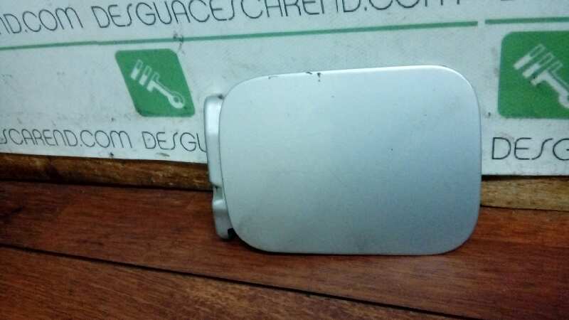 TAPA EXTERIOR COMBUSTIBLE