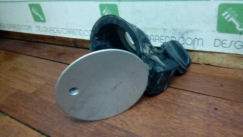 TAPA EXTERIOR COMBUSTIBLE