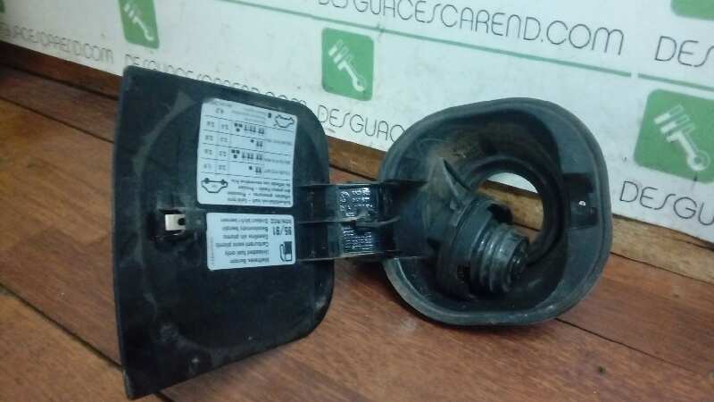 TAPA EXTERIOR COMBUSTIBLE