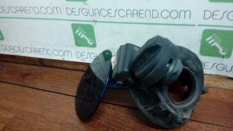 TAPA EXTERIOR COMBUSTIBLE
