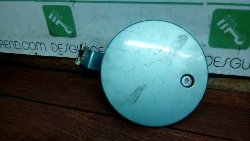 TAPA EXTERIOR COMBUSTIBLE