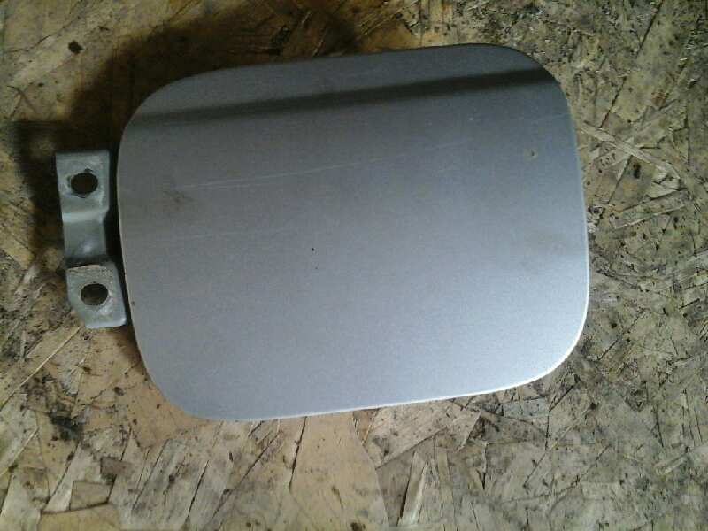 TAPA EXTERIOR COMBUSTIBLE