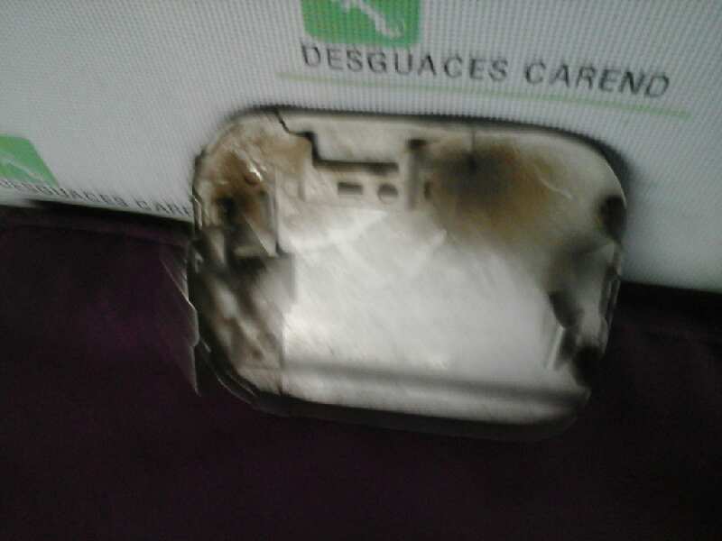 TAPA EXTERIOR COMBUSTIBLE