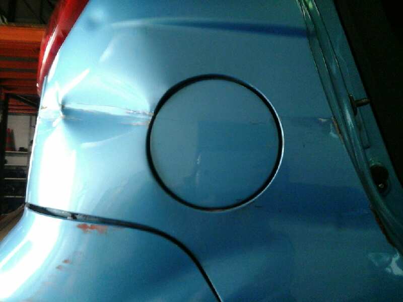 TAPA EXTERIOR COMBUSTIBLE