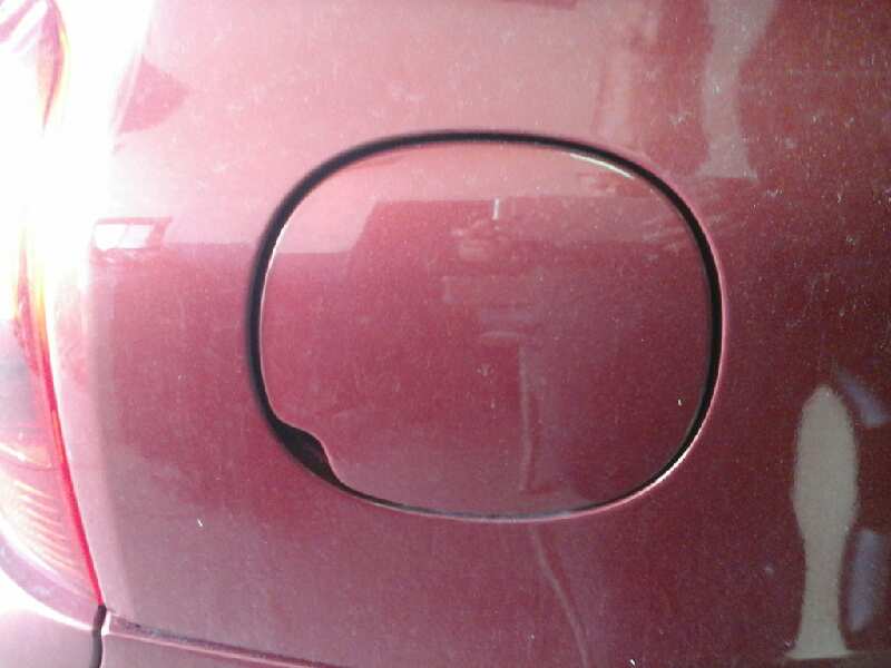 TAPA EXTERIOR COMBUSTIBLE