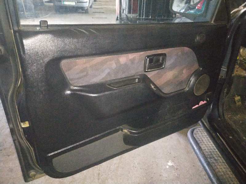GUARNECIDO PUERTA DELANTERA IZQUIERDA