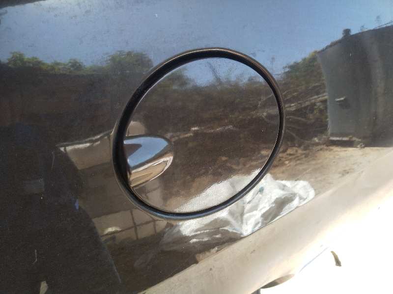 TAPA EXTERIOR COMBUSTIBLE