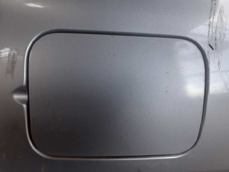 TAPA EXTERIOR COMBUSTIBLE