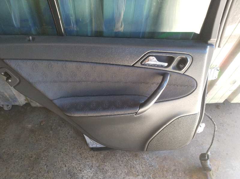 GUARNECIDO PUERTA TRASERA IZQUIERDA
