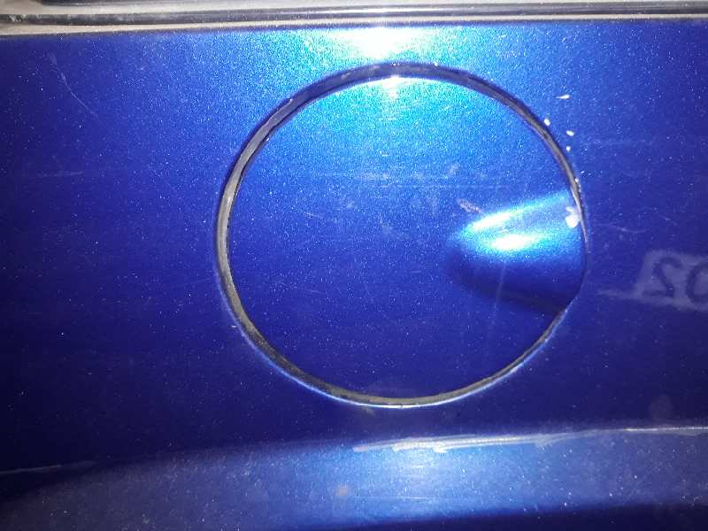 TAPA EXTERIOR COMBUSTIBLE