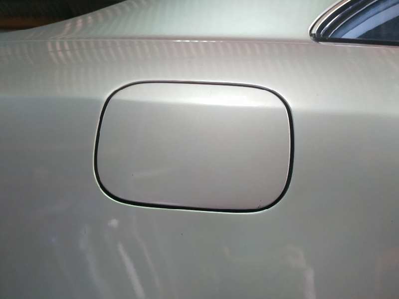 TAPA EXTERIOR COMBUSTIBLE