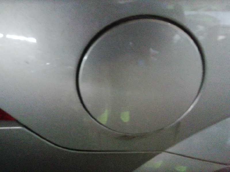 TAPA EXTERIOR COMBUSTIBLE