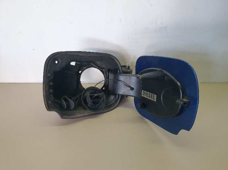 TAPA EXTERIOR COMBUSTIBLE