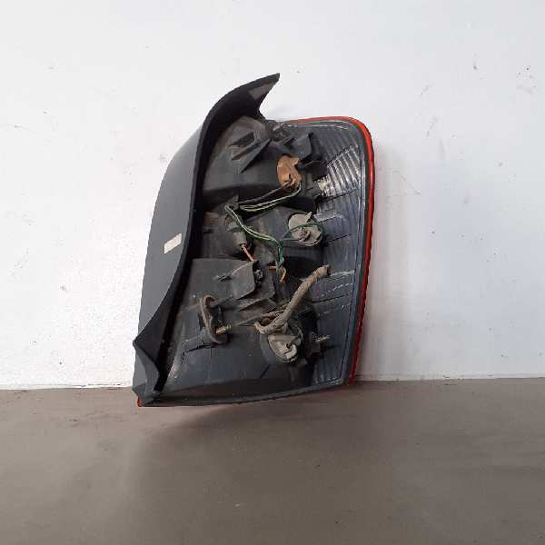 R1287 V182L PILOTO TRASERO IZQUIERDO MAZDA 323 BERL. F-S (BJ)