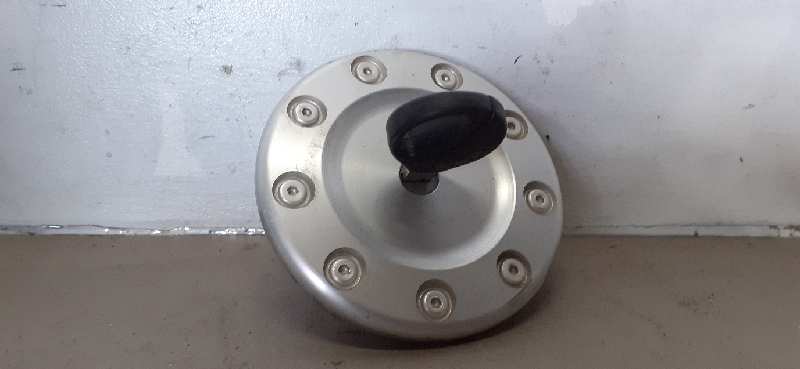 TAPA EXTERIOR COMBUSTIBLE