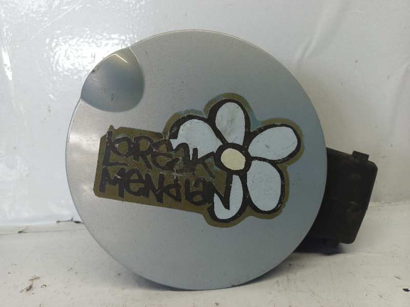 TAPA EXTERIOR COMBUSTIBLE