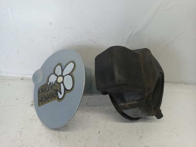 TAPA EXTERIOR COMBUSTIBLE