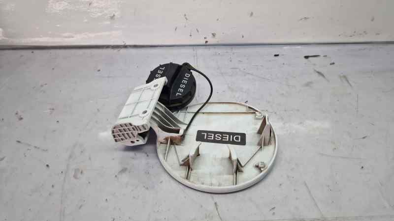 TAPA EXTERIOR COMBUSTIBLE