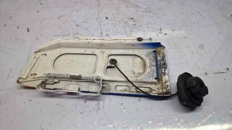 TAPA EXTERIOR COMBUSTIBLE