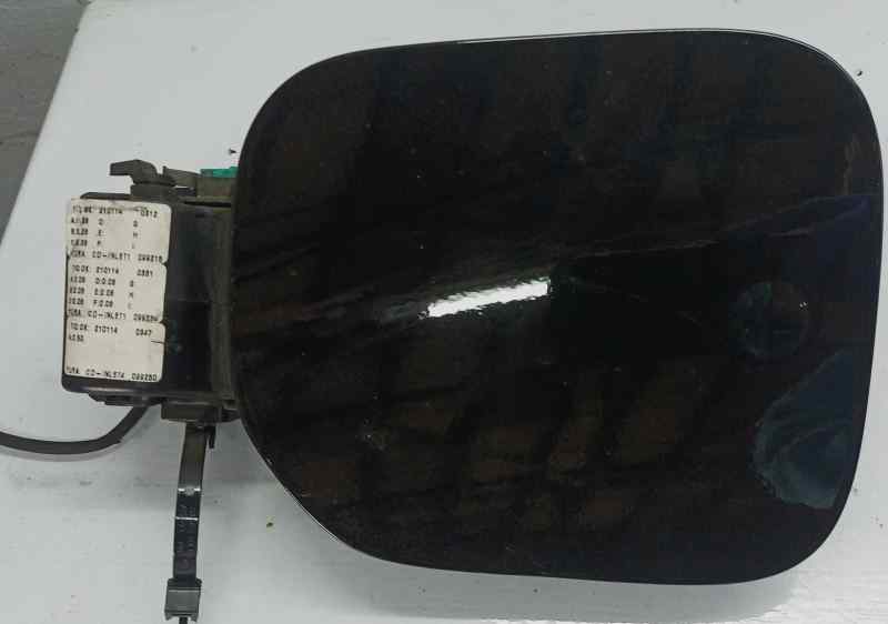 TAPA EXTERIOR COMBUSTIBLE