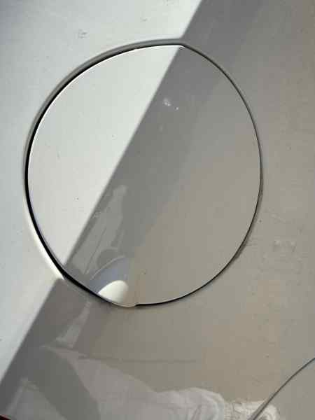 TAPA EXTERIOR COMBUSTIBLE