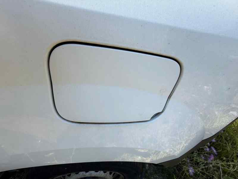 TAPA EXTERIOR COMBUSTIBLE