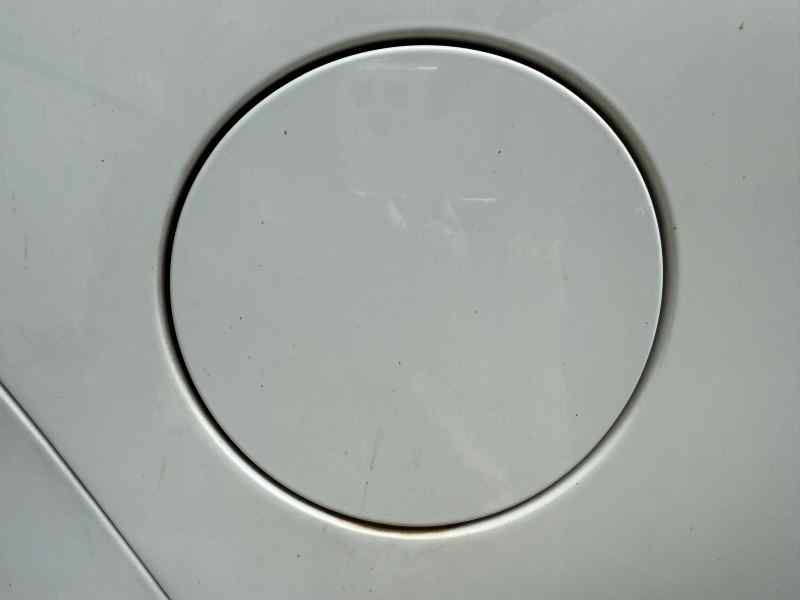 TAPA EXTERIOR COMBUSTIBLE