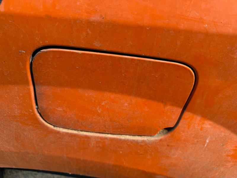 TAPA EXTERIOR COMBUSTIBLE