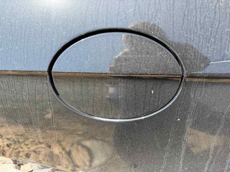 TAPA EXTERIOR COMBUSTIBLE