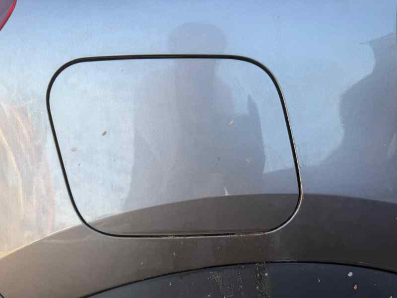 TAPA EXTERIOR COMBUSTIBLE