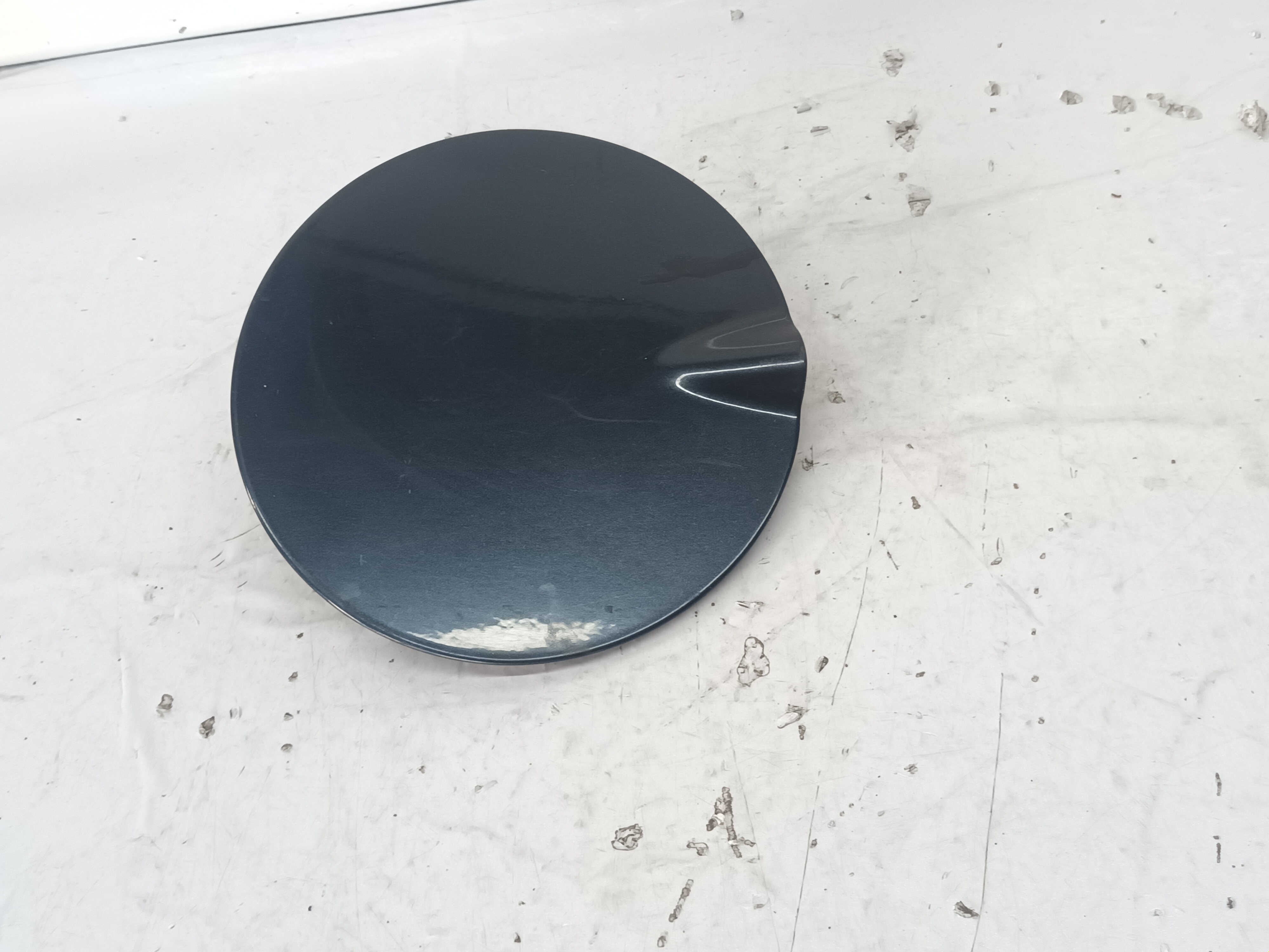 TAPA EXTERIOR COMBUSTIBLE